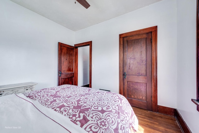 2021 1st St, Peru, IL 61354 - bedroom with wood finished floors, ceiling fan, and baseboards