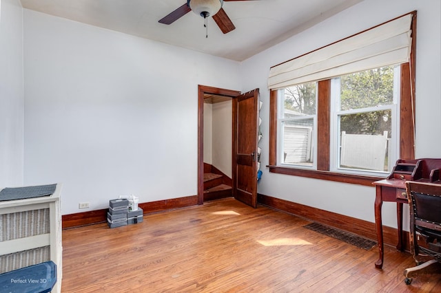 2021 1st St, Peru, IL 61354 - bedroom with baseboards, visible vents, and wood-type flooring