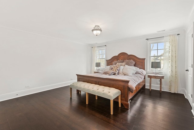 91 Wagner Rd, Northfield, IL 60093 - bedroom featuring dark wood-type flooring, visible vents, crown molding, and baseboards