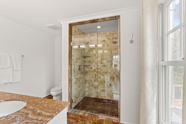 91 Wagner Rd, Northfield, IL 60093 - bathroom featuring toilet, a healthy amount of sunlight, crown molding, and a stall shower