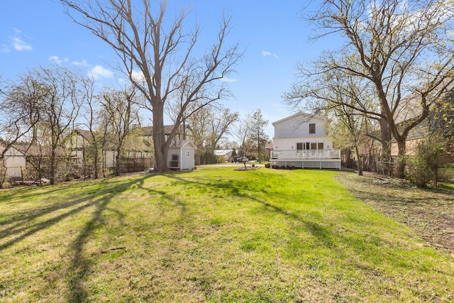 91 Wagner Rd, Northfield, IL 60093 - view of yard with a wooden deck, fence, an outbuilding, and a storage shed