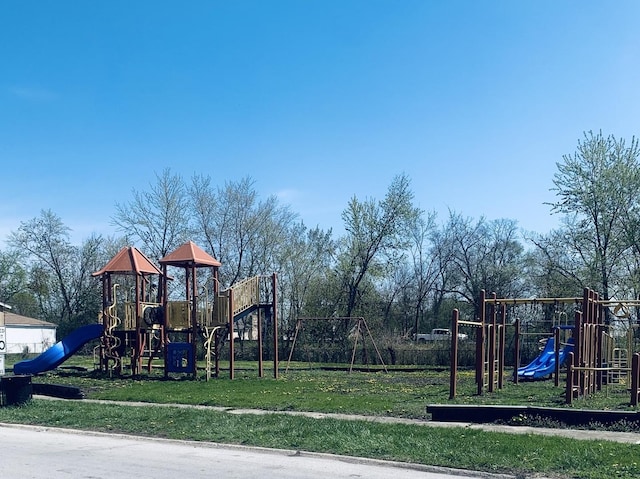 community playground featuring a yard