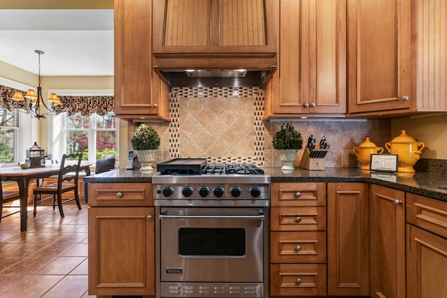 915 W Clark St, Champaign, IL 61821 - kitchen with designer range, a chandelier, and brown cabinetry