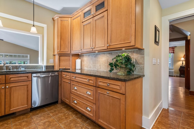 915 W Clark St, Champaign, IL 61821 - kitchen with dishwasher, tasteful backsplash, radiator, dark tile patterned floors, and decorative light fixtures