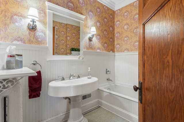 915 W Clark St, Champaign, IL 61821 - full bathroom featuring a wainscoted wall, a tub, and wallpapered walls