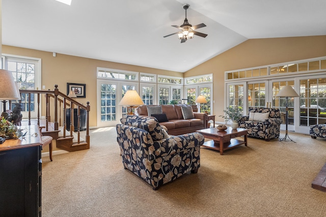 915 W Clark St, Champaign, IL 61821 - carpeted living area with stairway, lofted ceiling, and ceiling fan