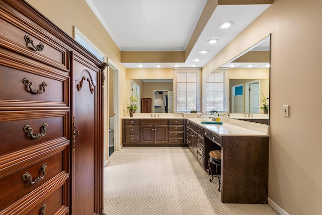 915 W Clark St, Champaign, IL 61821 - bathroom featuring crown molding, double vanity, toilet, and recessed lighting