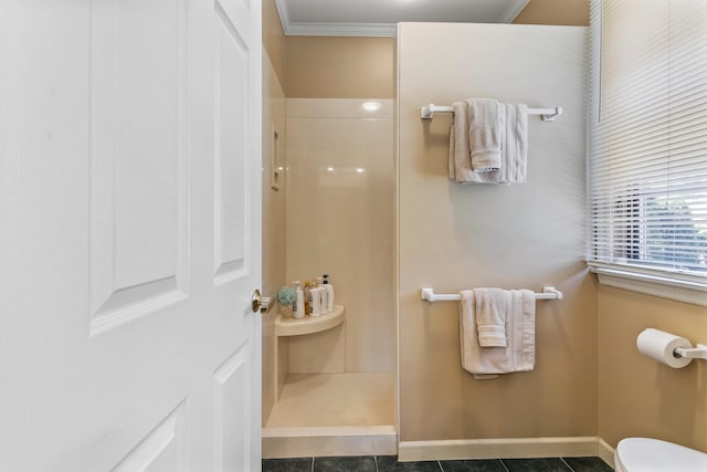915 W Clark St, Champaign, IL 61821 - full bathroom featuring walk in shower, tile patterned flooring, toilet, baseboards, and ornamental molding