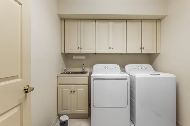 915 W Clark St, Champaign, IL 61821 - washroom featuring washing machine and clothes dryer, cabinet space, and baseboards