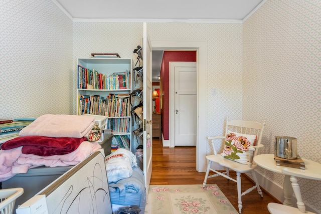 915 W Clark St, Champaign, IL 61821 - bedroom featuring wood finished floors, wallpapered walls, and crown molding