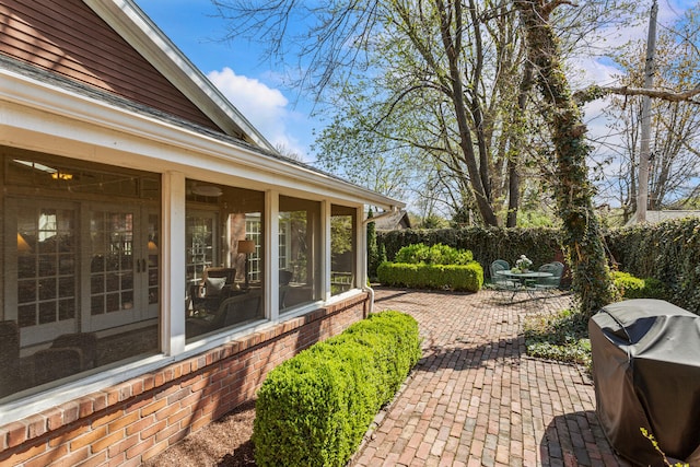 915 W Clark St, Champaign, IL 61821 - fenced backyard with a patio area and a sunroom