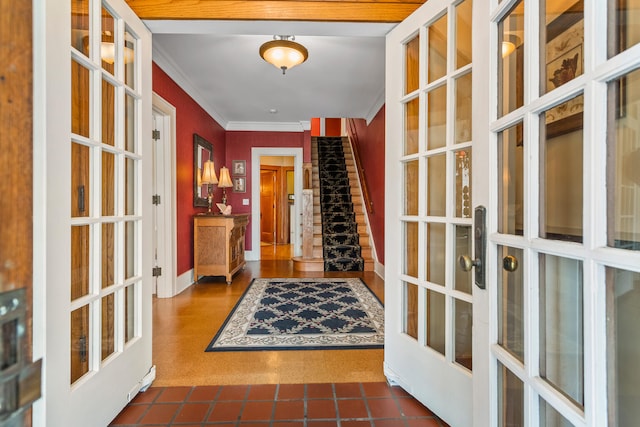 915 W Clark St, Champaign, IL 61821 - foyer featuring french doors, ornamental molding, and baseboards