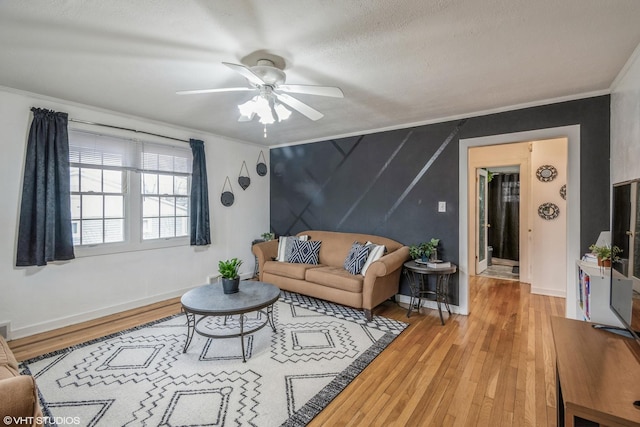 241 Tiverton Ln, Steger, IL 60475 - living room featuring a ceiling fan, baseboards, ornamental molding, and wood finished floors