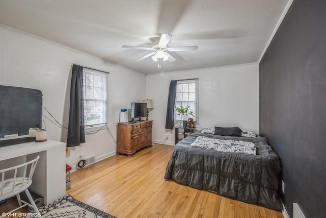 241 Tiverton Ln, Steger, IL 60475 - bedroom featuring light wood-type flooring, a ceiling fan, crown molding, and visible vents