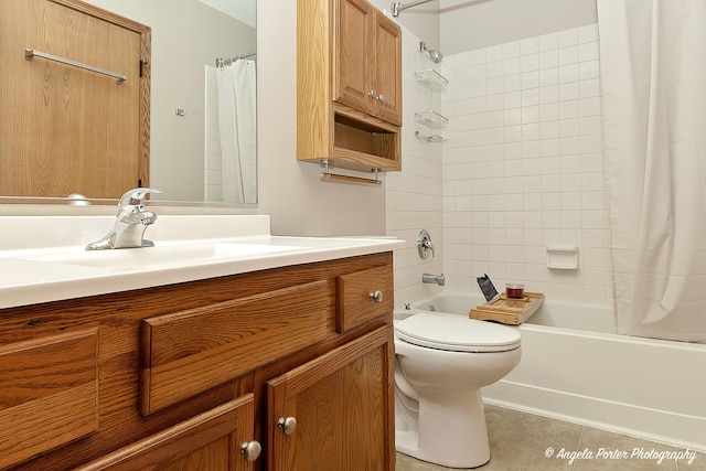 bathroom featuring tile patterned flooring, toilet, vanity, and shower / bathtub combination with curtain