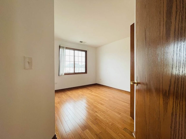 15753 Scotsglen Rd, Orland Park, IL 60462 - unfurnished room with baseboards, light wood-style flooring, and visible vents
