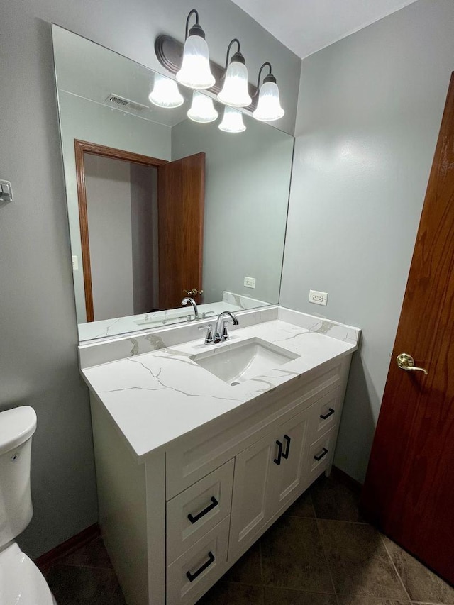 15753 Scotsglen Rd, Orland Park, IL 60462 - bathroom with visible vents, toilet, vanity, and tile patterned floors