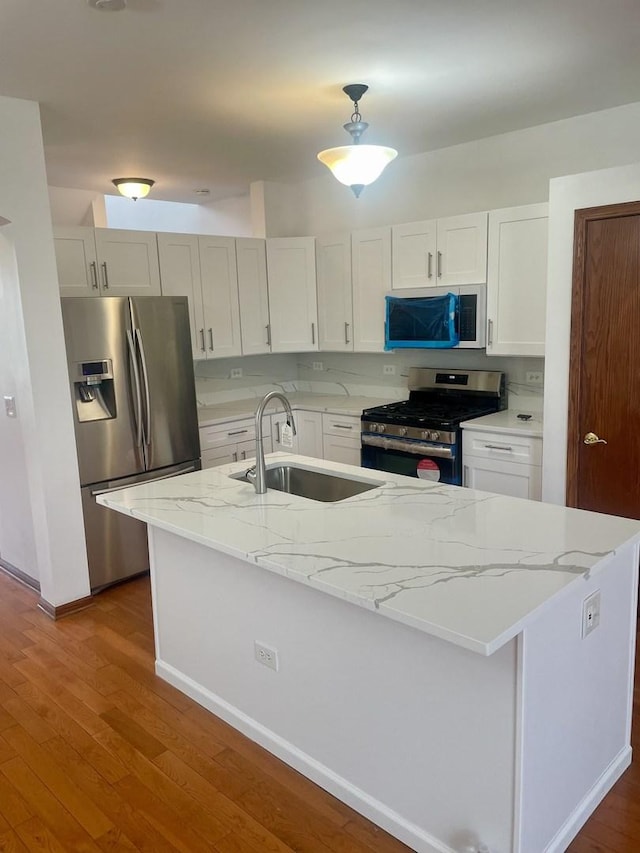 15753 Scotsglen Rd, Orland Park, IL 60462 - kitchen featuring wood finished floors, appliances with stainless steel finishes, white cabinetry, and a sink