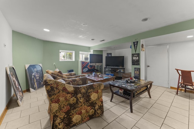living area featuring baseboards, light tile patterned flooring, visible vents, and recessed lighting
