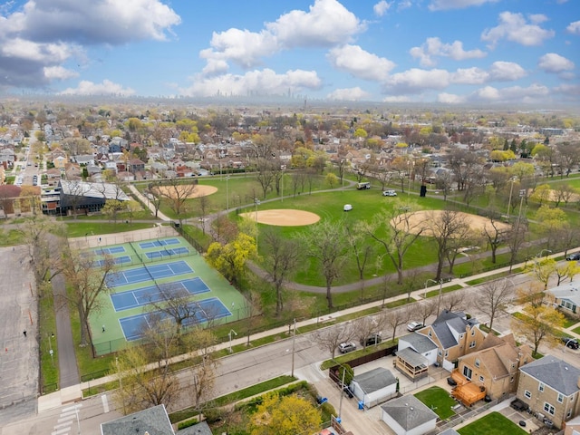 birds eye view of property with a residential view