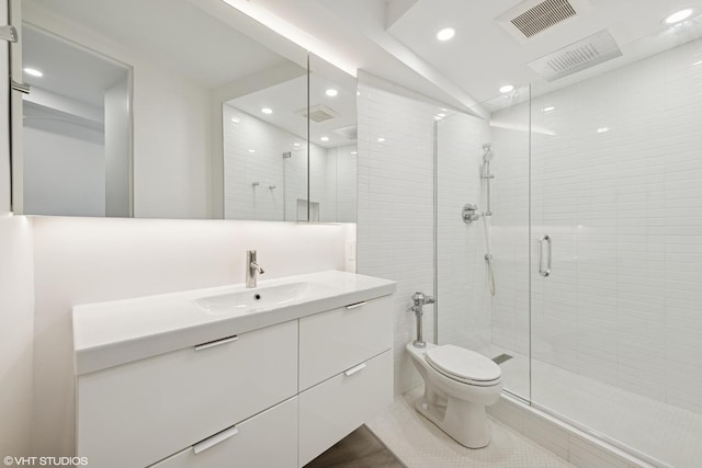 300 N State St Unit 3827, Chicago, IL 60654 - full bath featuring toilet, visible vents, recessed lighting, a shower stall, and vanity