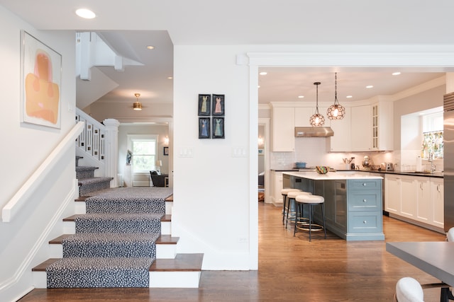 938 Edgemere Ct, Evanston, IL 60202 - stairs featuring wood finished floors and recessed lighting