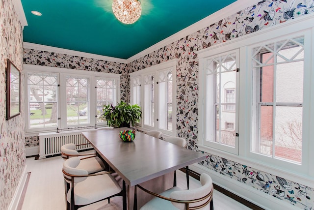 938 Edgemere Ct, Evanston, IL 60202 - dining room featuring wallpapered walls, radiator, and crown molding
