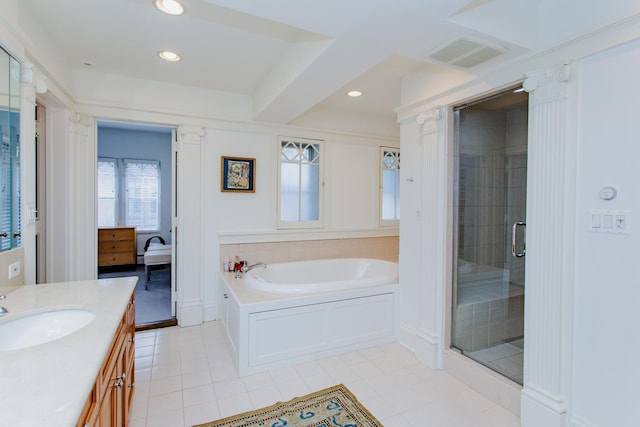938 Edgemere Ct, Evanston, IL 60202 - bathroom featuring tile patterned floors, vanity, a garden tub, a shower stall, and recessed lighting