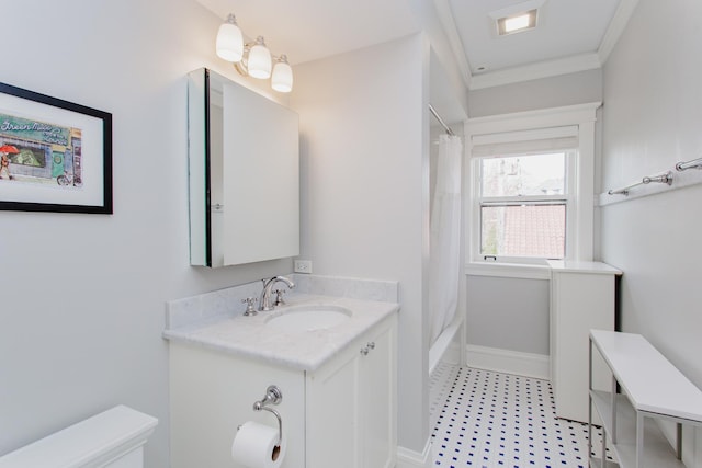 938 Edgemere Ct, Evanston, IL 60202 - bathroom featuring toilet, vanity, baseboards, shower / bath combination with curtain, and ornamental molding