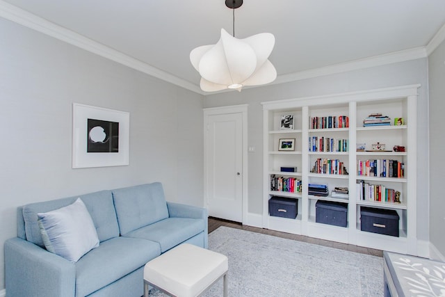 938 Edgemere Ct, Evanston, IL 60202 - living area with crown molding, wood finished floors, and baseboards