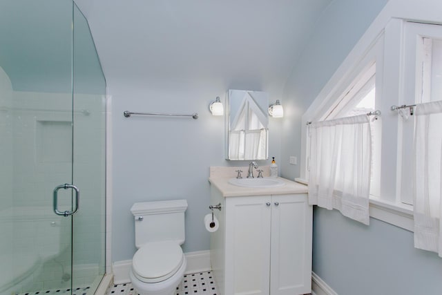 938 Edgemere Ct, Evanston, IL 60202 - bathroom featuring vanity, a stall shower, toilet, and baseboards
