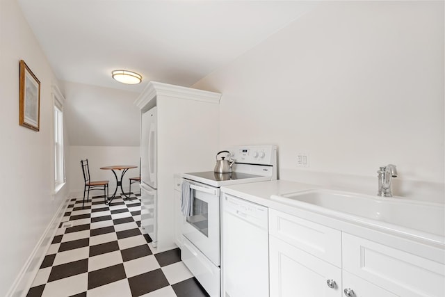 938 Edgemere Ct, Evanston, IL 60202 - kitchen featuring white appliances, dark flooring, a sink, light countertops, and white cabinets