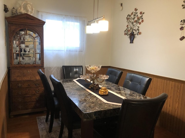 926 S Lathrop Ave, Forest Park, IL 60130 - dining area featuring dark wood-type flooring and a wainscoted wall