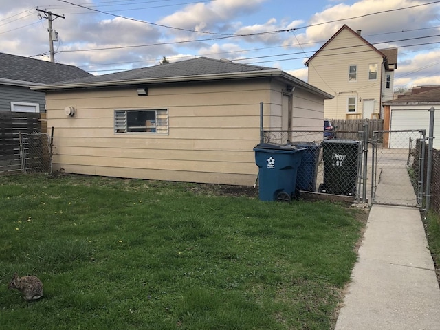 926 S Lathrop Ave, Forest Park, IL 60130 - view of home's exterior with fence, a gate, and a yard