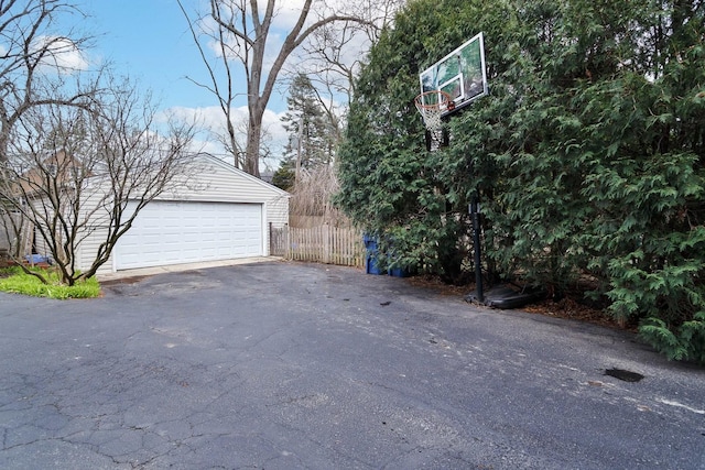 detached garage with fence