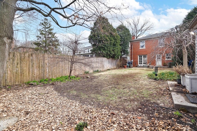 view of yard with fence
