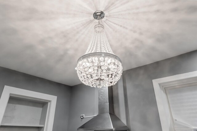 details featuring an inviting chandelier