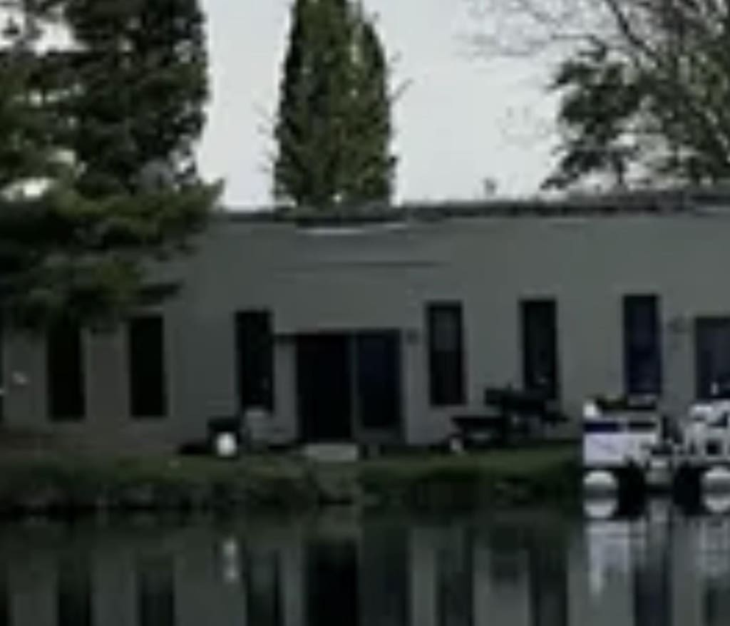 18721 N 800 E Rd, Carlock, IL 61725 - view of building exterior with a water view