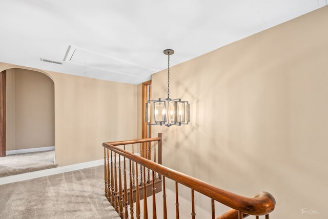 331 E Joliet Hwy, New Lenox, IL 60451 - hallway with attic access, carpet flooring, an upstairs landing, arched walkways, and baseboards
