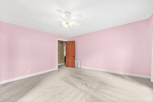 331 E Joliet Hwy, New Lenox, IL 60451 - carpeted empty room featuring radiator, a ceiling fan, and baseboards