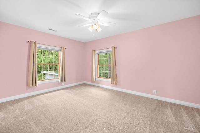 331 E Joliet Hwy, New Lenox, IL 60451 - empty room with carpet floors, healthy amount of natural light, and a ceiling fan