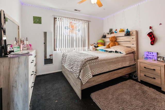 5118 Carol Ln, Gurnee, IL 60031 - bedroom with dark carpet, visible vents, and a ceiling fan