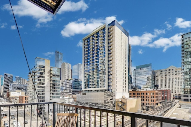 balcony featuring a city view