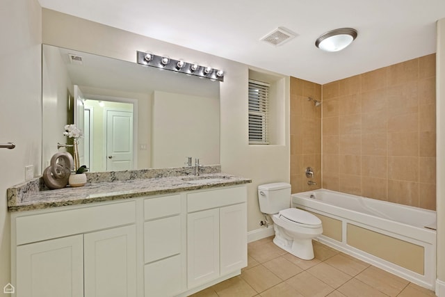 bathroom with tile patterned floors, washtub / shower combination, toilet, and visible vents