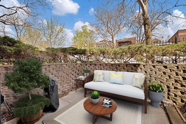 balcony with outdoor lounge area and a patio area