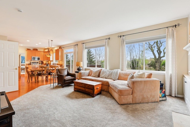 34457 N Bluestem Rd, Round Lake, IL 60073 - living area with plenty of natural light, recessed lighting, and light wood-style flooring