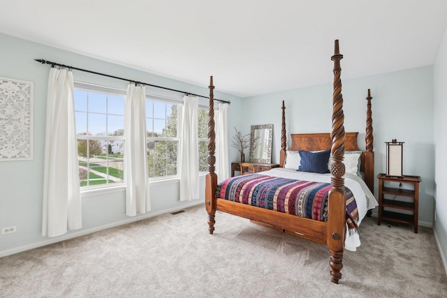 34457 N Bluestem Rd, Round Lake, IL 60073 - carpeted bedroom with baseboards and visible vents