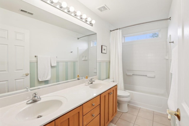 34457 N Bluestem Rd, Round Lake, IL 60073 - bathroom featuring visible vents, a sink, and tile patterned flooring