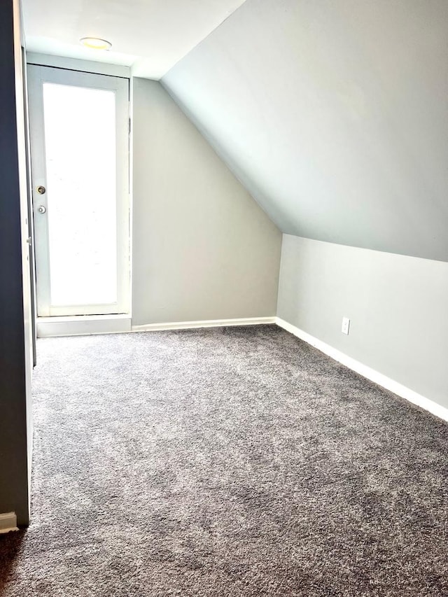 2245 S Homan Ave, Chicago, IL 60623 - additional living space with lofted ceiling, baseboards, and carpet
