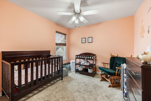 1296 Lake Shore Dr, Carol Stream, IL 60188 - carpeted bedroom with a crib, baseboards, and ceiling fan